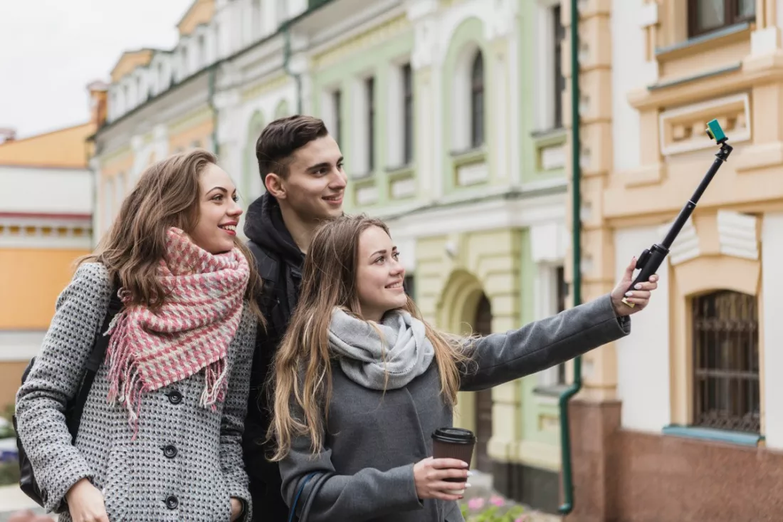 Friends taking a selfie in an old town