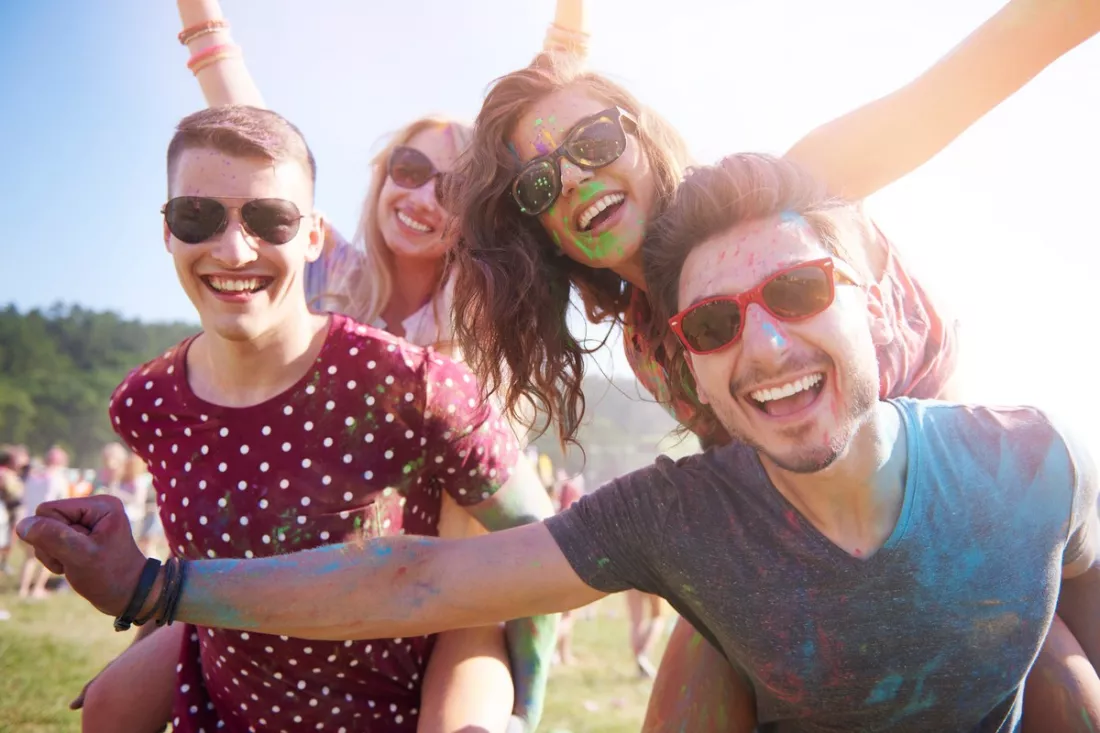Friends having fun at a summer festival